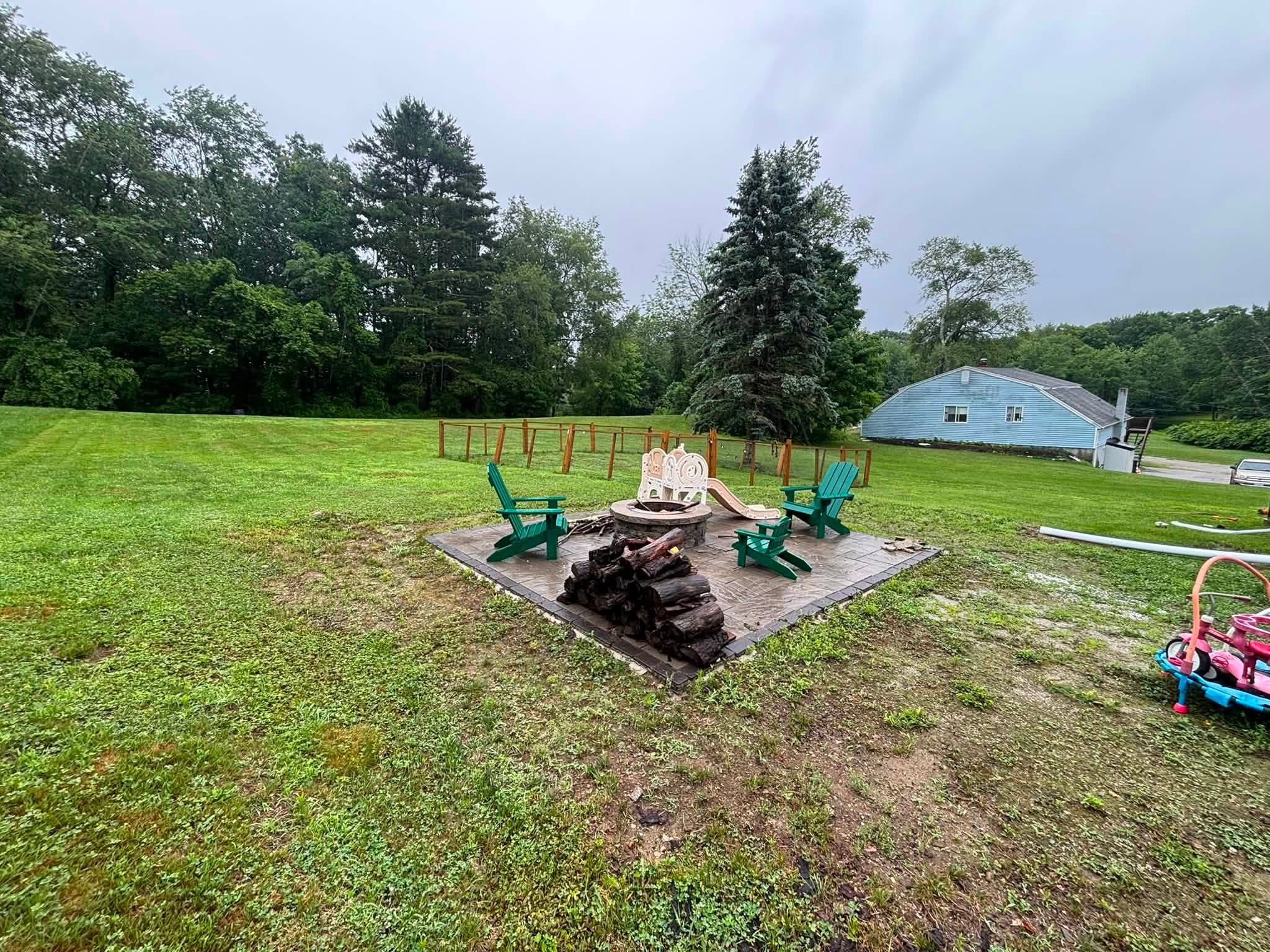 Problem area before drainage solution and natural stone path